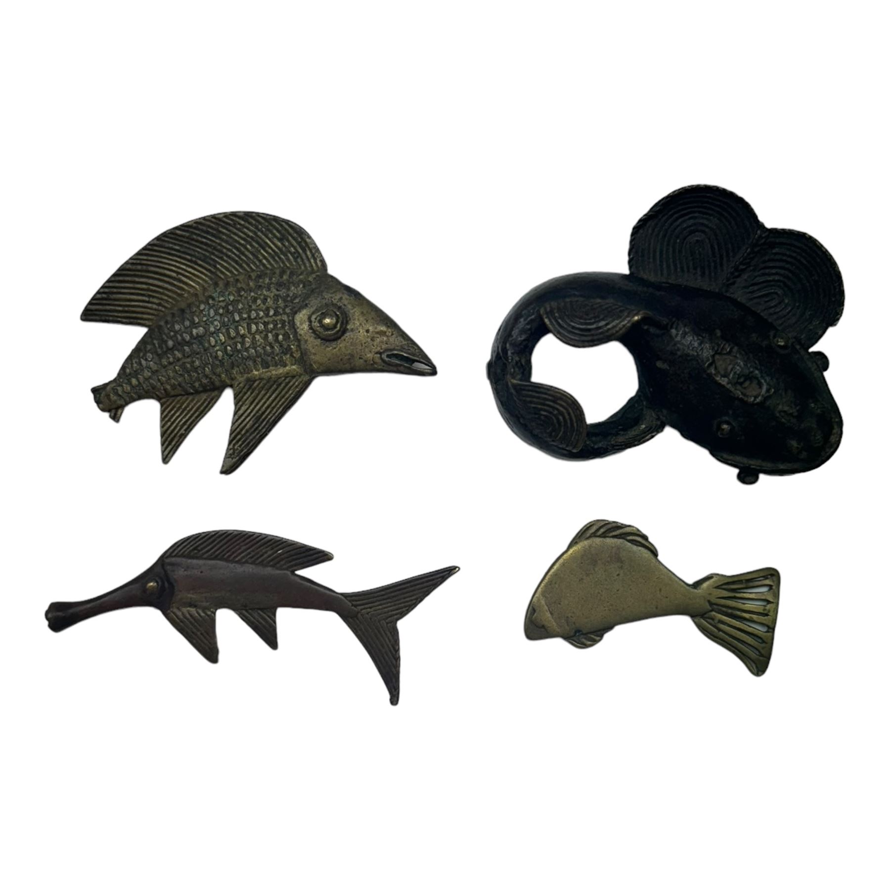 Fourteen Ashanti brass and other metal gold weights, modelled as various fish, including Silure fish, one example bearing label stamped Sotheby's 3 Dec 1984, largest example L8cm