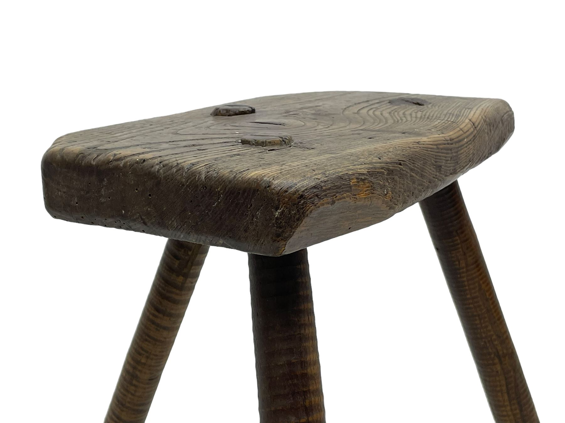 19th century elm cutler's stool, shaped seat on three rib turned supports