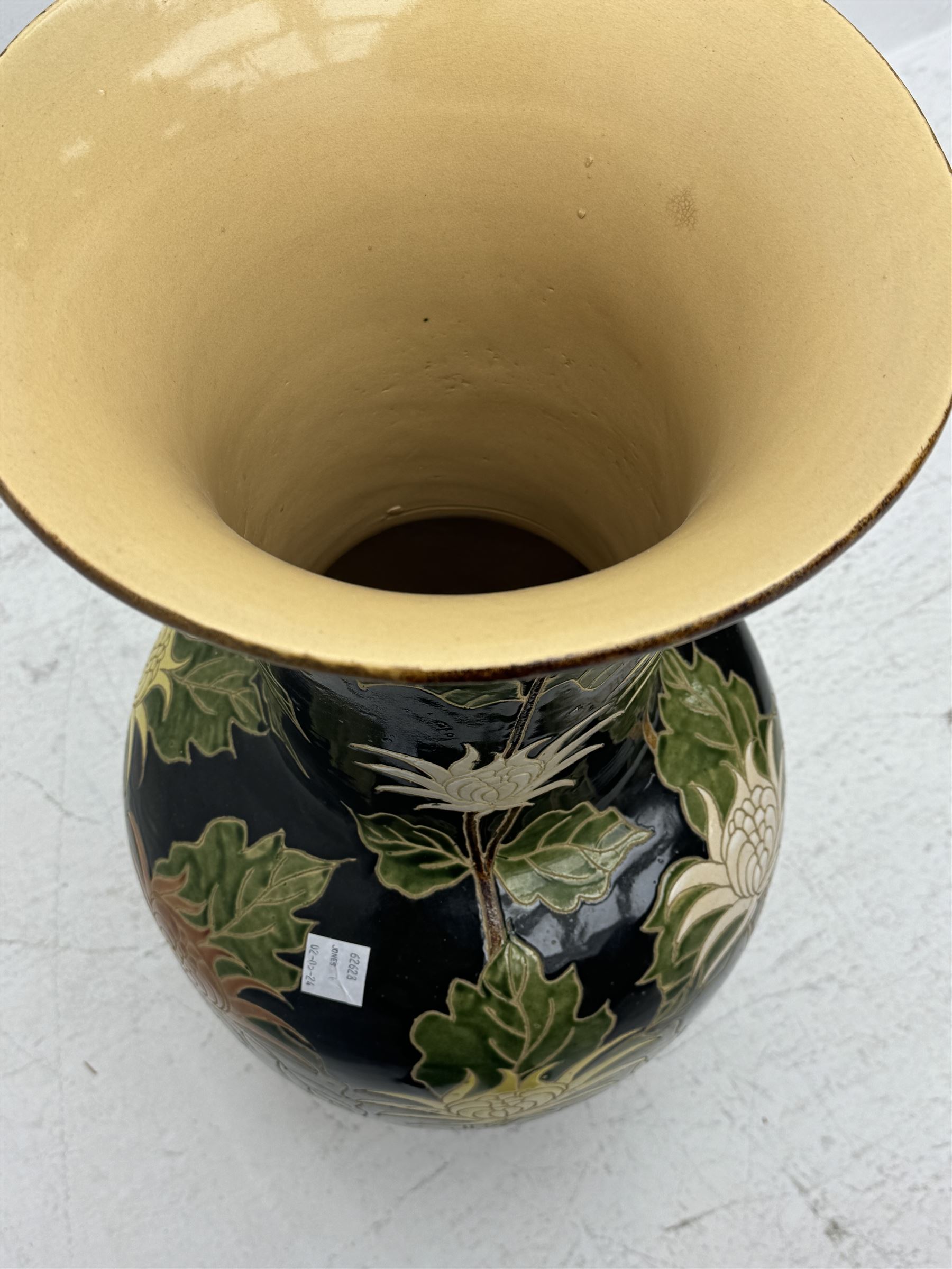 Floor vase with stylised flowers on a black ground, H84cm