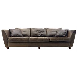 Collins & Hayes - contemporary grande three-seater sofa upholstered in brown leather, with curved arms and standing on tapering feet