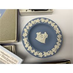Wedgwood blue Jasperware, including commemorative plates of American independence, together with a black Jasperware trinket dish 