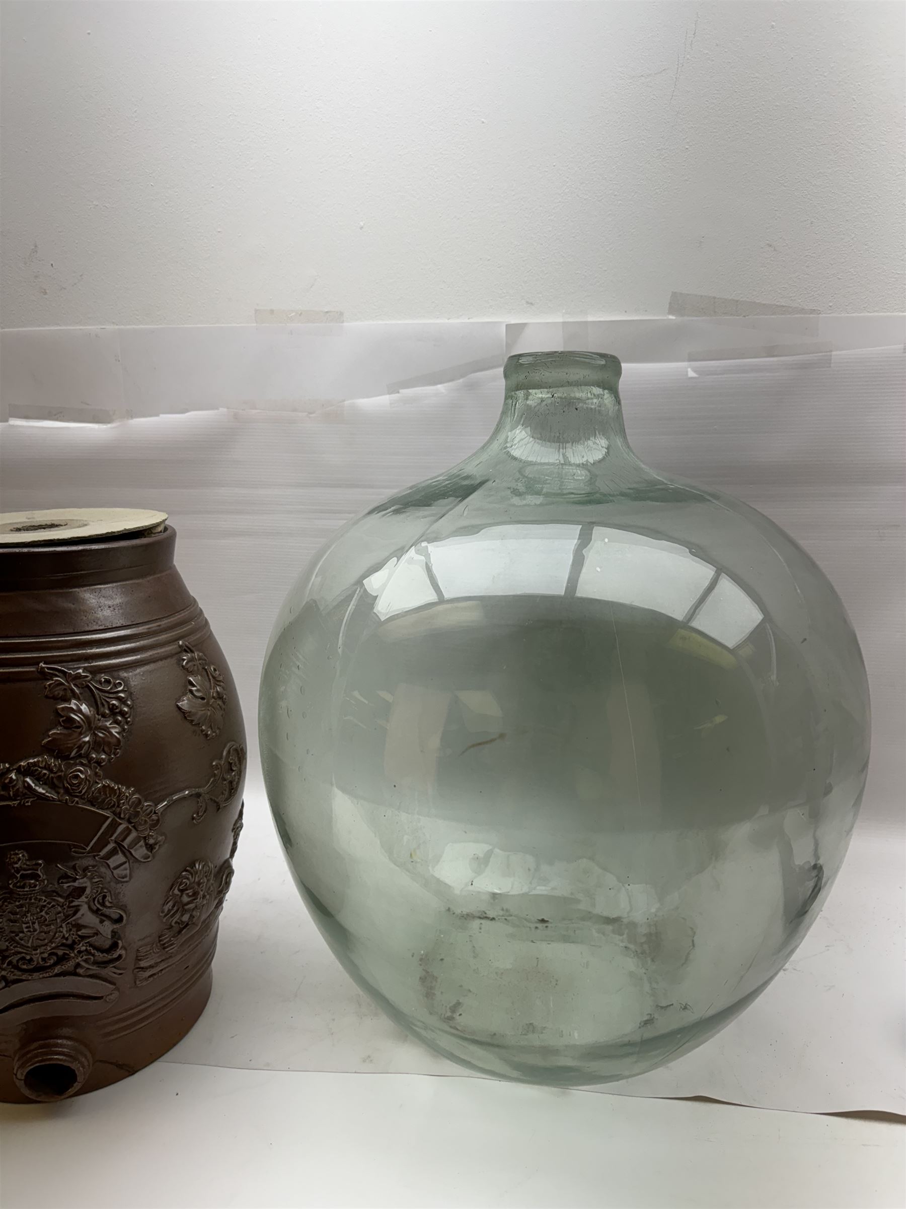 Salt glazed stoneware barrel together with a glass carboy, carboy H54cm  