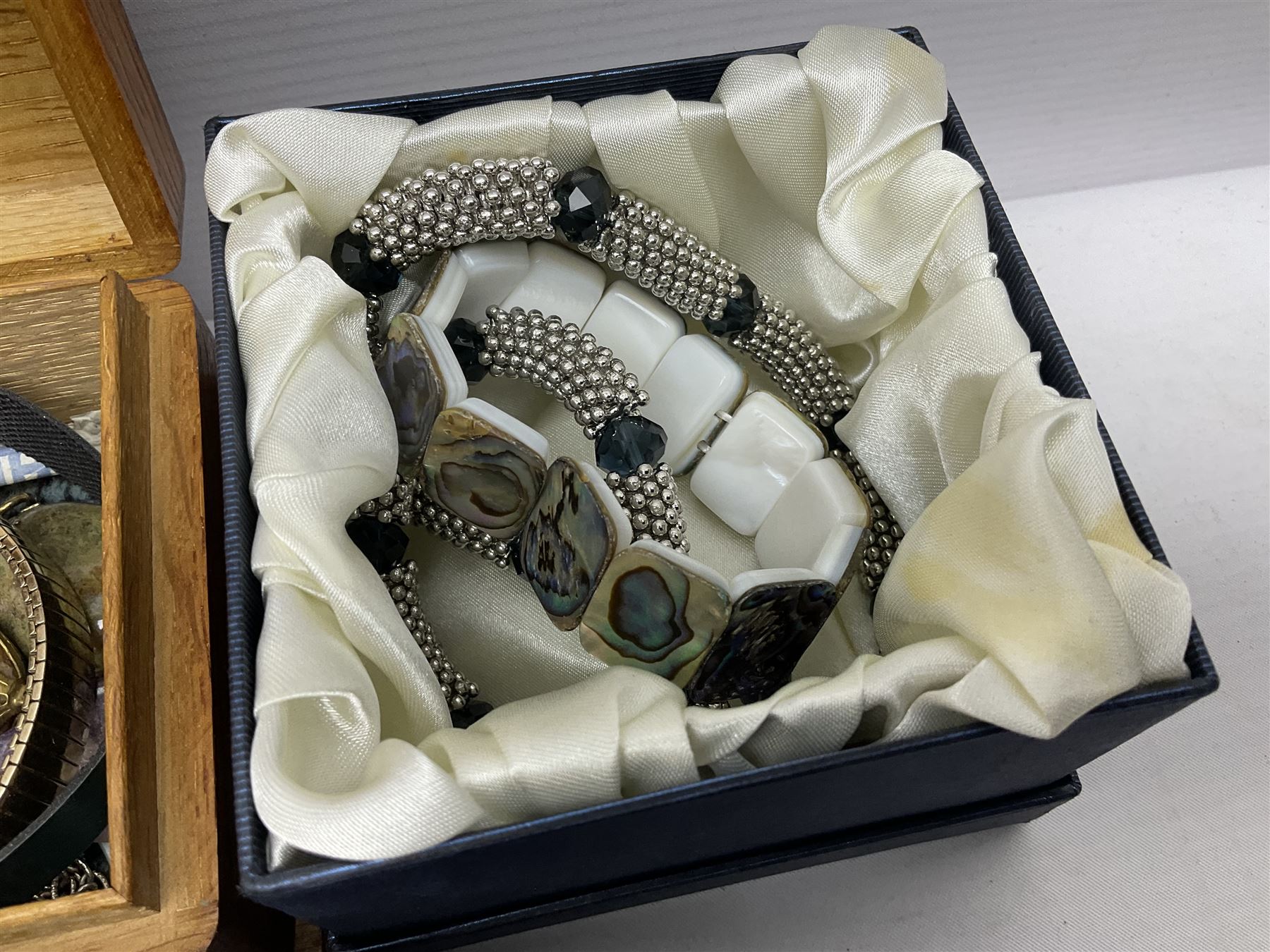 Silver brooch and a collection of costume jewellery, together with ceramic trinket box, foldable photograph frame and other collectables