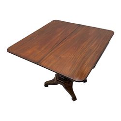 Victorian mahogany tea table, rectangular fold-over and swivel action top with rounded corners, ogee moulded frieze with applied bead, octagonal column mounted by cluster column uprights, on step moulded octagonal foot with applied beading, splayed and scrolled feet with recessed castors 