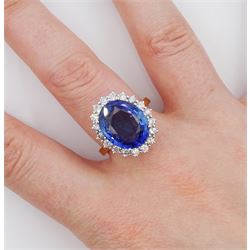 18ct gold oval cut unheated sapphire and round brilliant cut diamond ring, sapphire 7.46 carat, total diamond weight approx 0.70 carat, with Reunigem-Lab report