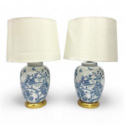 Pair of Chinese table lamps of baluster form, each decorated with landscape scene, raised ...