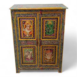 Indian painted hardwood storage cupboard, with painted floral decoration, enclosed by two panelled doors, the interior fitted with one shelf 