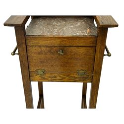 Early 20th century oak vanity stand, with circular adjustable mirror, brass towel rails to the sides, marble inset top and upper compartment, over additional storage compartment with hinged front, on splayed supports with stretchers