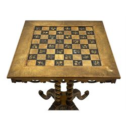 Late 19th century walnut games table, the square top with sunken inlaid chessboard decorated with inlaid floral bouquets, shaped and pierced frieze rails, on quadruple spiral turned pillars, concaved square platform inlaid with flowers, on acanthus leaf carved splayed supports with scrolled terminals 