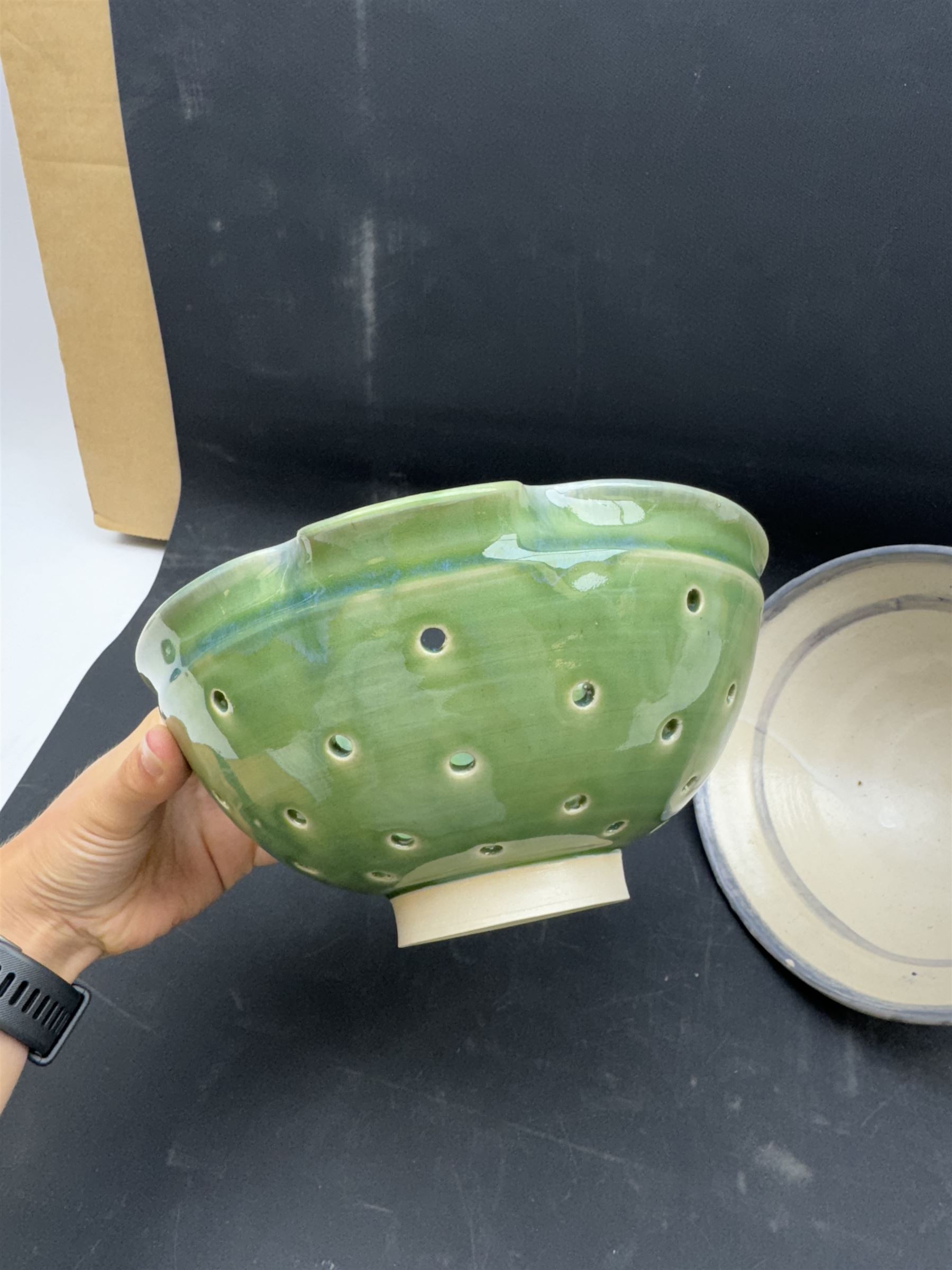 Studio pottery bowl of conical form, with blue band to the rim, together with Arwyn Jones dish, D20cm