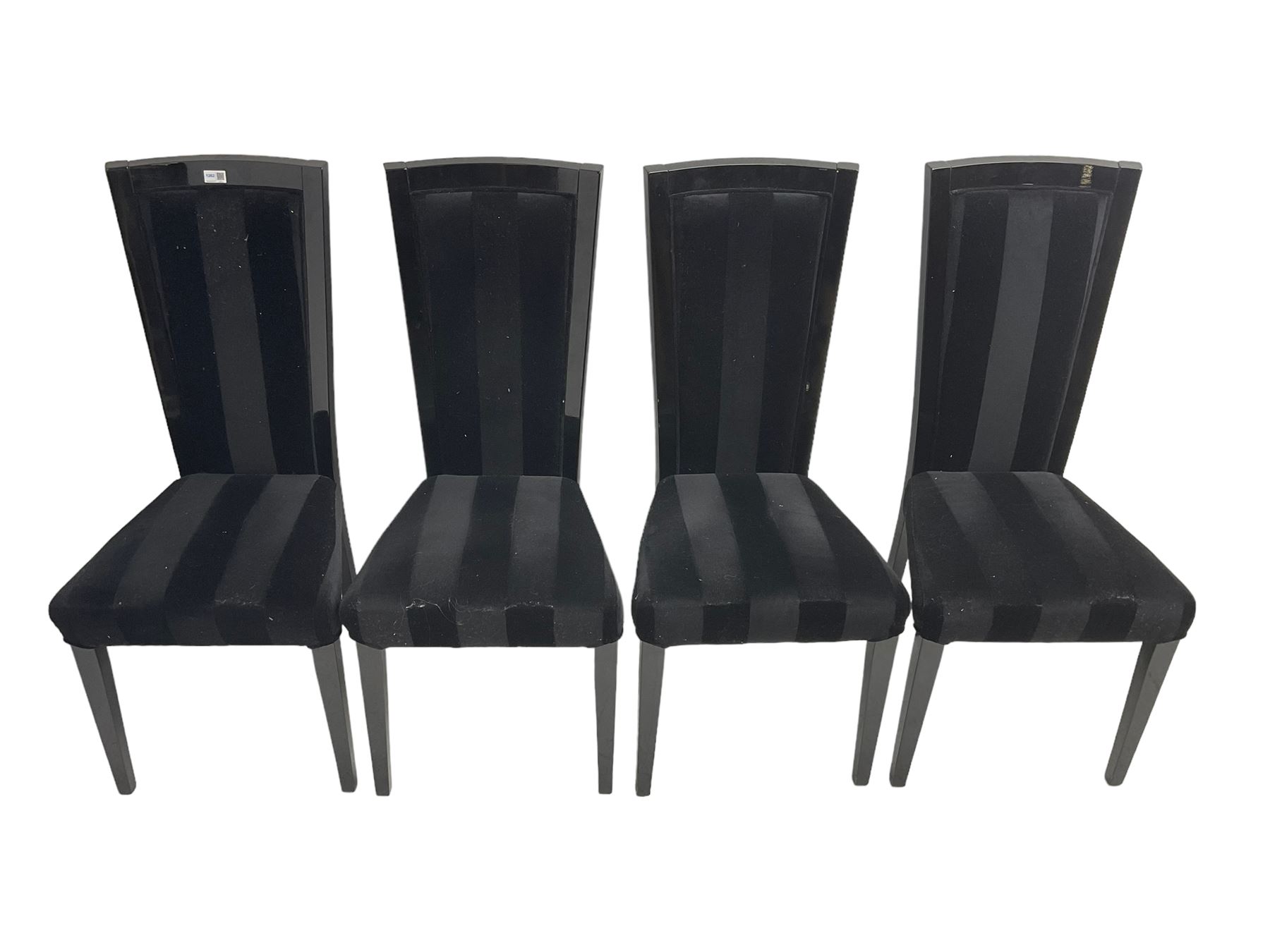 Set of four contemporary ebonised high back dining chairs, upholstered in black velvet fabric