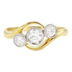 Early 20th century milgrain set three stone old cut diamond ring, stamped 18ct, total diamond weight approx 0.35 carat