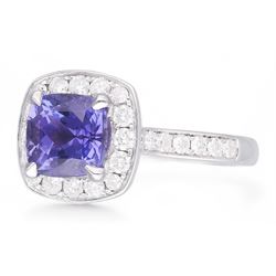 18ct white gold cushion cut tanzanite and round brilliant cut diamond cluster ring, with diamond set shoulders, hallmarked, tanzanite 2.25 carat, total diamond weight approx 0.55 carat