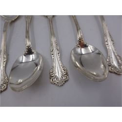 Group of American silver flatware, comprising set of three table spoons, each with beaded stem and engraved with initialsm marked for Mermod & Jaccard Jewelery Co. and a set of six American silver dessert spoons, each engraved with initial in a scrolling border, stamped Sterling