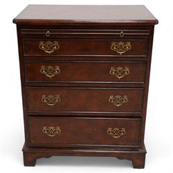 Small Georgian design walnut chest, rectangular moulded top with crossbanding and feather bands, shaped canted corners, slide over four graduating cock-beaded drawers, pierced brass handle plates, on bracket feet 