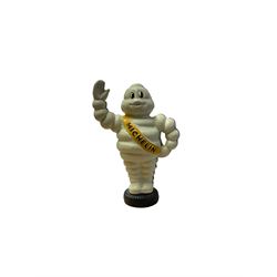 Cast iron money box figure of Michelin Man, stood on a tyre, H24cm