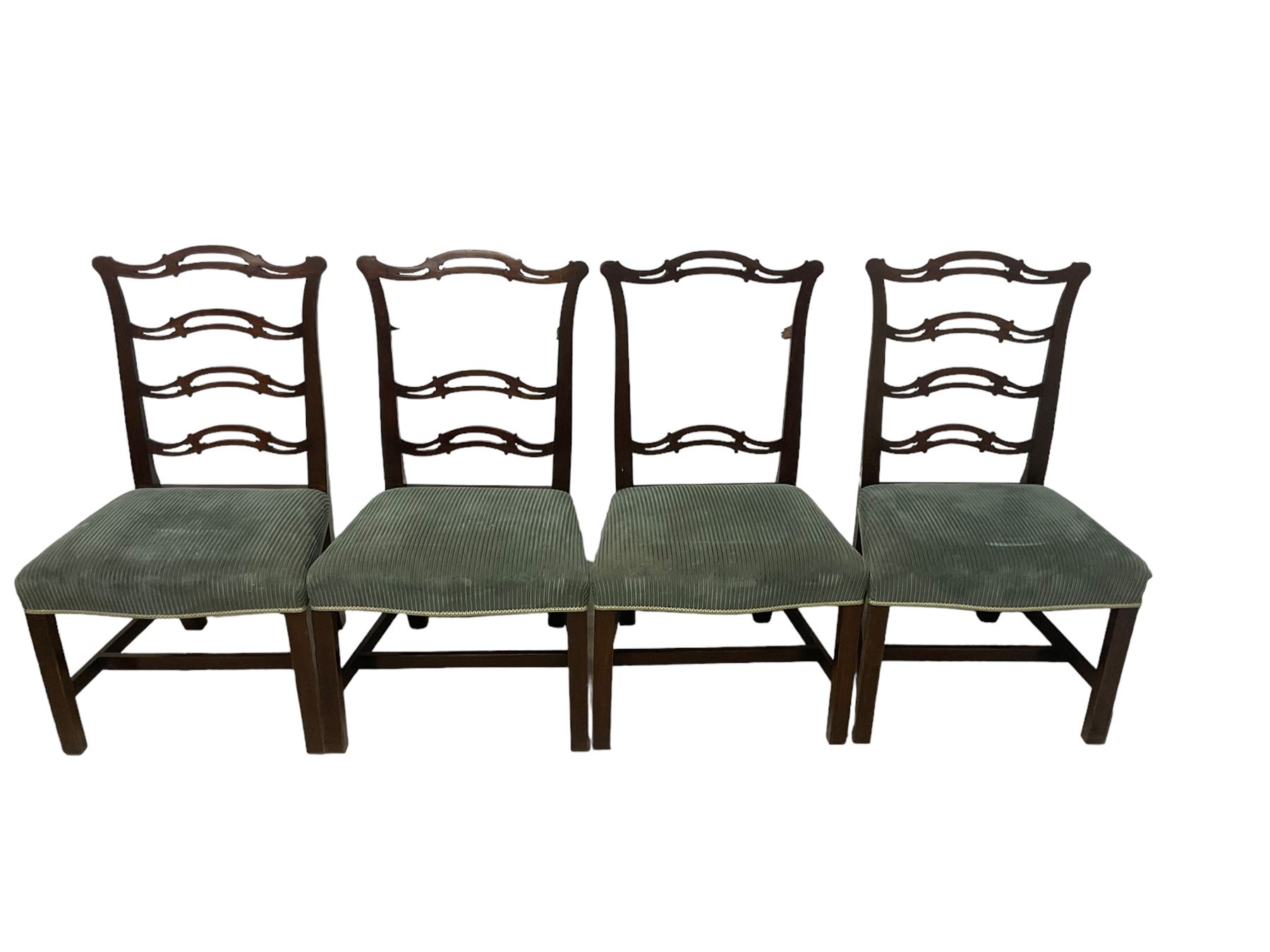 Set of twelve (10+2) Chippendale revival stained beech dining chairs, pierced waived ladder backs with over-stuffed over seats, on square moulded supports joined by stretchers