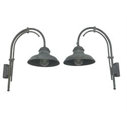 Two grey outdoor metal lamps, arched form with circular shades