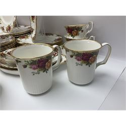 Royal Albert Old Country Roses pattern part tea and dinner service, to include two tureens, eight dinner plates, six side plates, twelve bowls, two mugs, seven teacups and saucers, milk jug,  twelve cake plates, six soup bowls and saucers, candlesticks, etc (95)