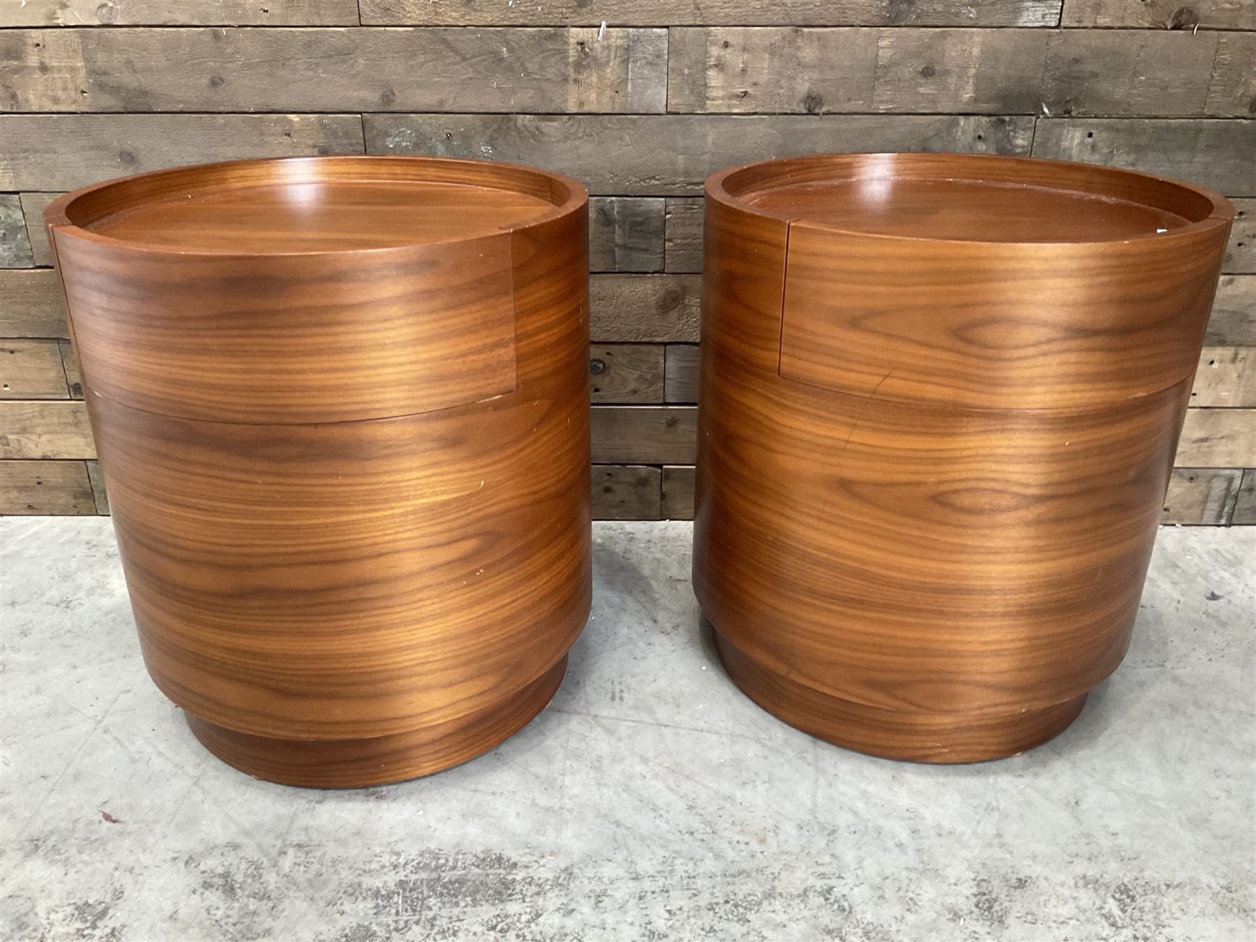 Pair of walnut circular barrel shaped lamp tables, fitted with single drawer