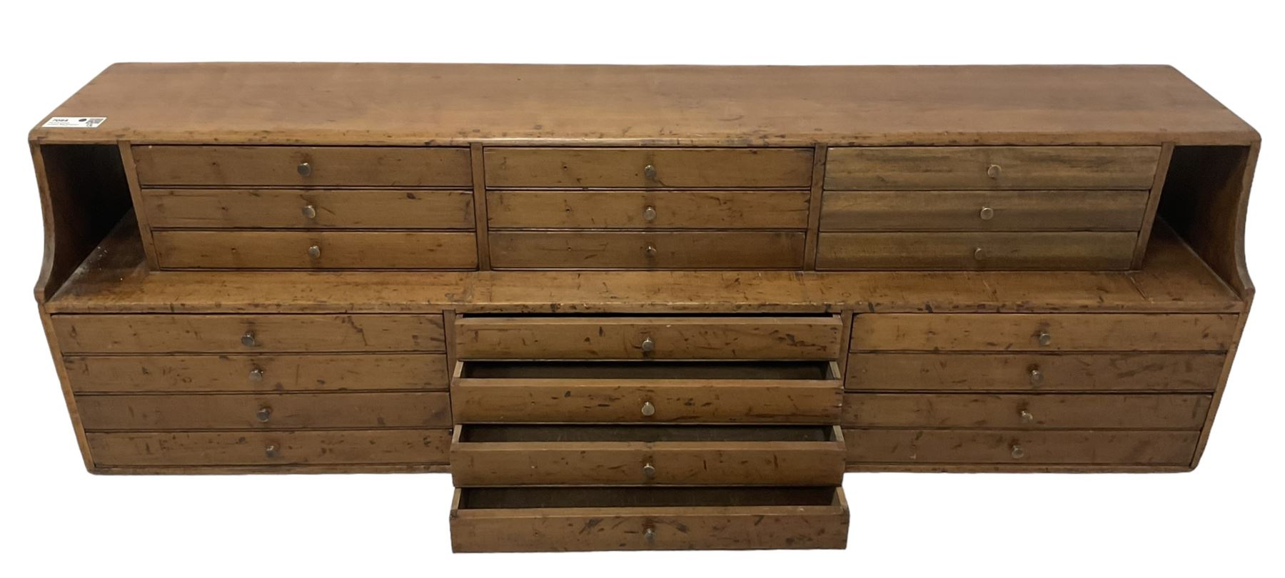 Late 19th century stained beech Solicitor's desktop bank of correspondence drawers, two-tiered, fitted with twenty one drawers, together with related brass plaques