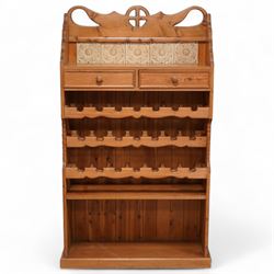 Waxed pine storage wine rack, fitted with open shelves, two drawers and bottle storage