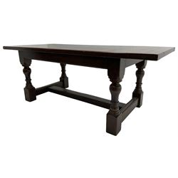 20th century oak refectory dining table, rectangular cleated top on turned supports joined by H-stretcher