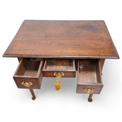 18th century country oak low-boy, rectangular top with moulded edge, fitted with three cross-banded drawers with brass handle plates, shaped apron on cabriole supports with pad feet