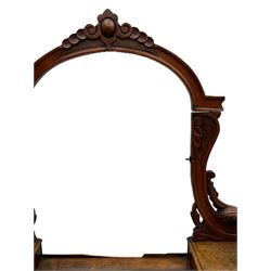 19th century figured walnut dressing table, the raised bevelled mirror back in carved foliage frame with scrolled terminals, fitted with central hinged compartment flanked by small trinket drawers, serpentine moulded top over single frieze drawer, on cabriole supports united by a platform base