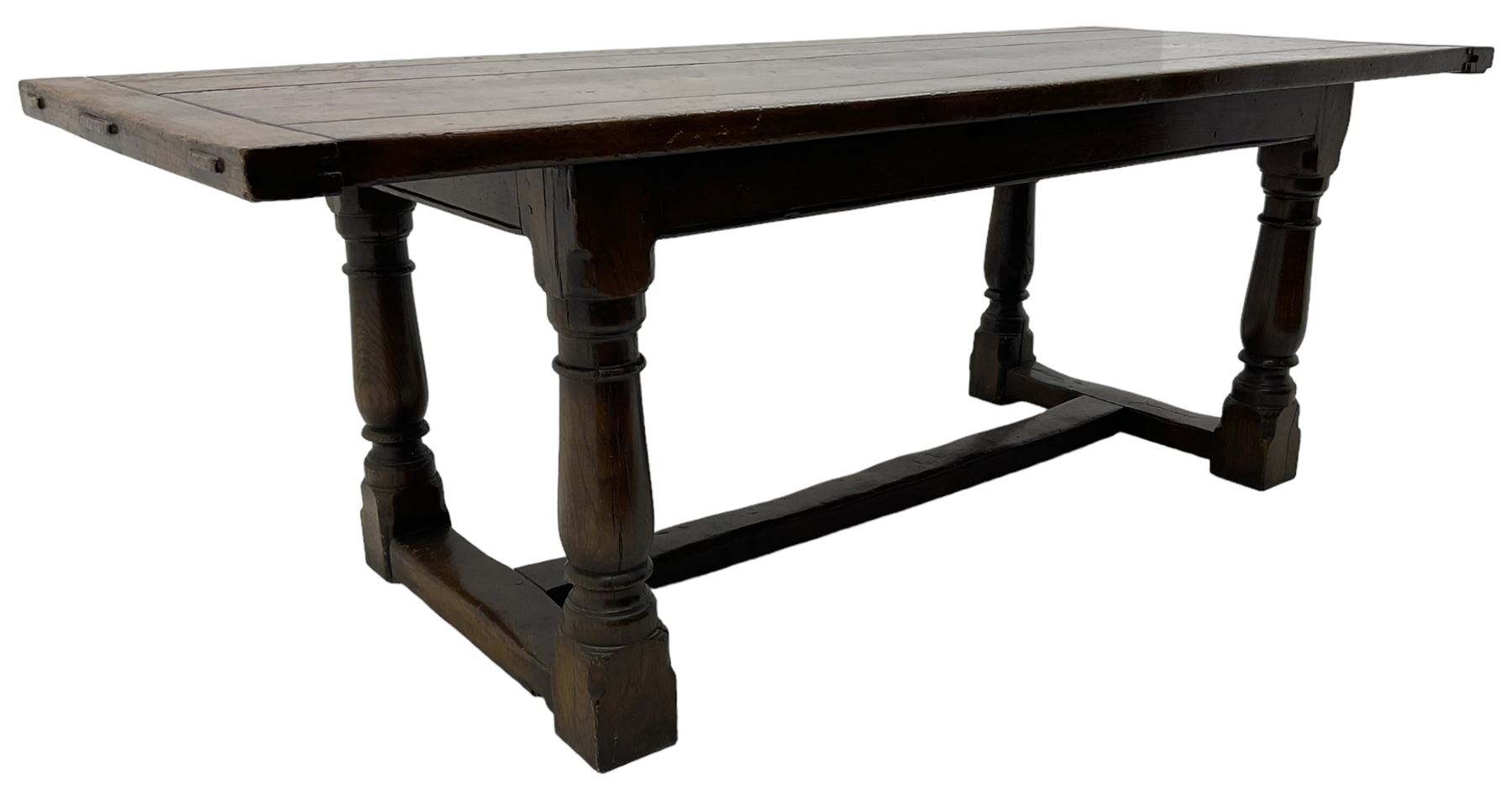 20th century Jacobean design oak refectory dining table, rectangular plank top with cleated ends, on turned supports united by H-stretchers 