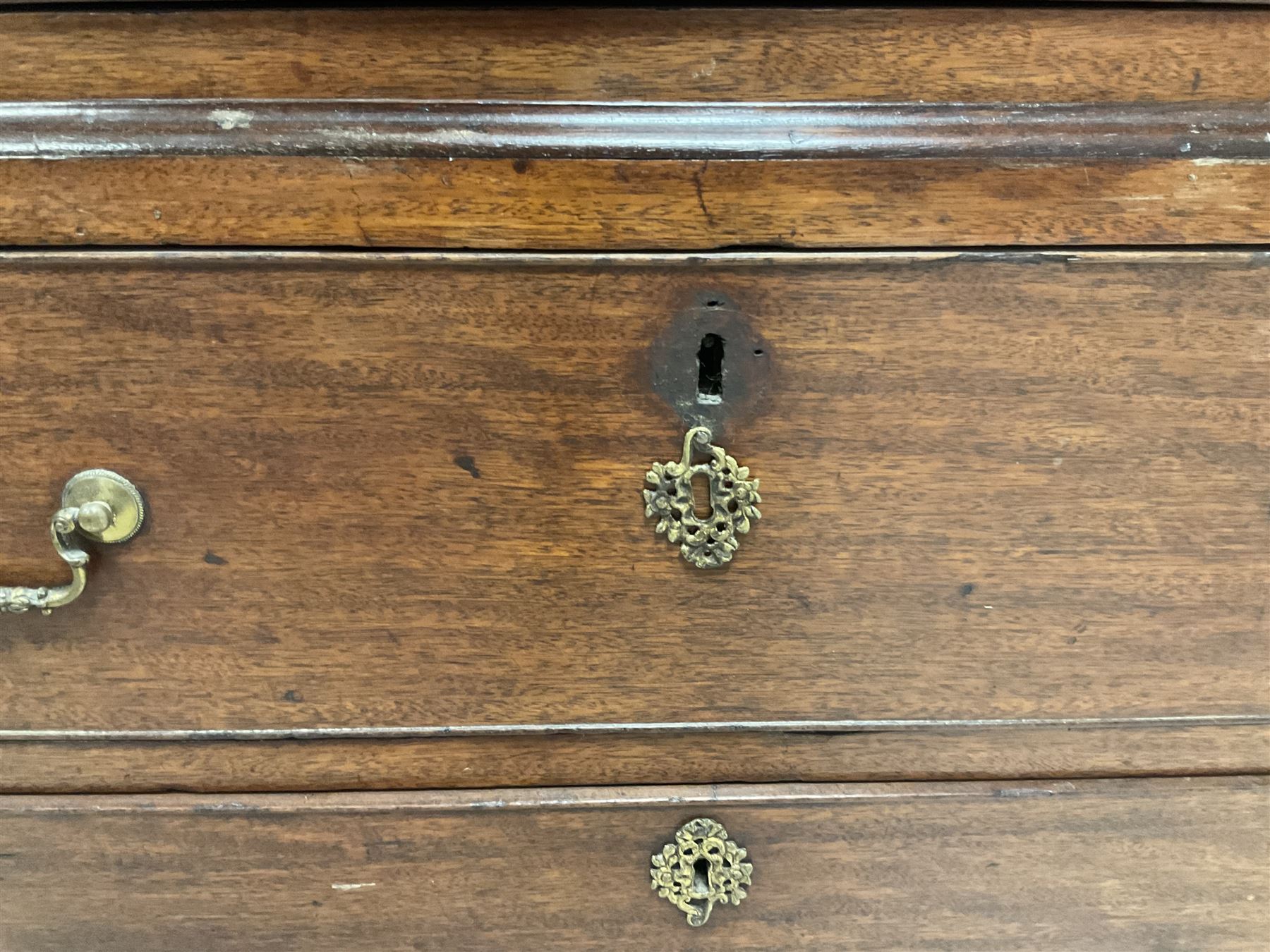 George III mahogany chest-on-chest, projecting cornice over two short and five long graduating cock-beaded drawers, each fitted with original brass swan neck handles, raised on bracket feet