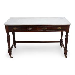 James Shoolbred & Co. (London: 1814-1934) - Edwardian mahogany washstand, rectangular white marble top over two frieze drawers with reed mouldings, on turned supports united by plain stretchers with brass and ceramic castors, the drawer stamped 'Jas Shoolbred & Co.'