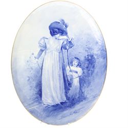 Doulton Burslem oval plaque, printed and painted with a mother and child withing a gilt border, 35cm x 27.5cm 