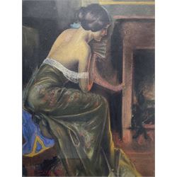 Delphin Enjolras (French 1857-1945): Lady Warming by the Fireside, pastel signed 39cm x 29cm