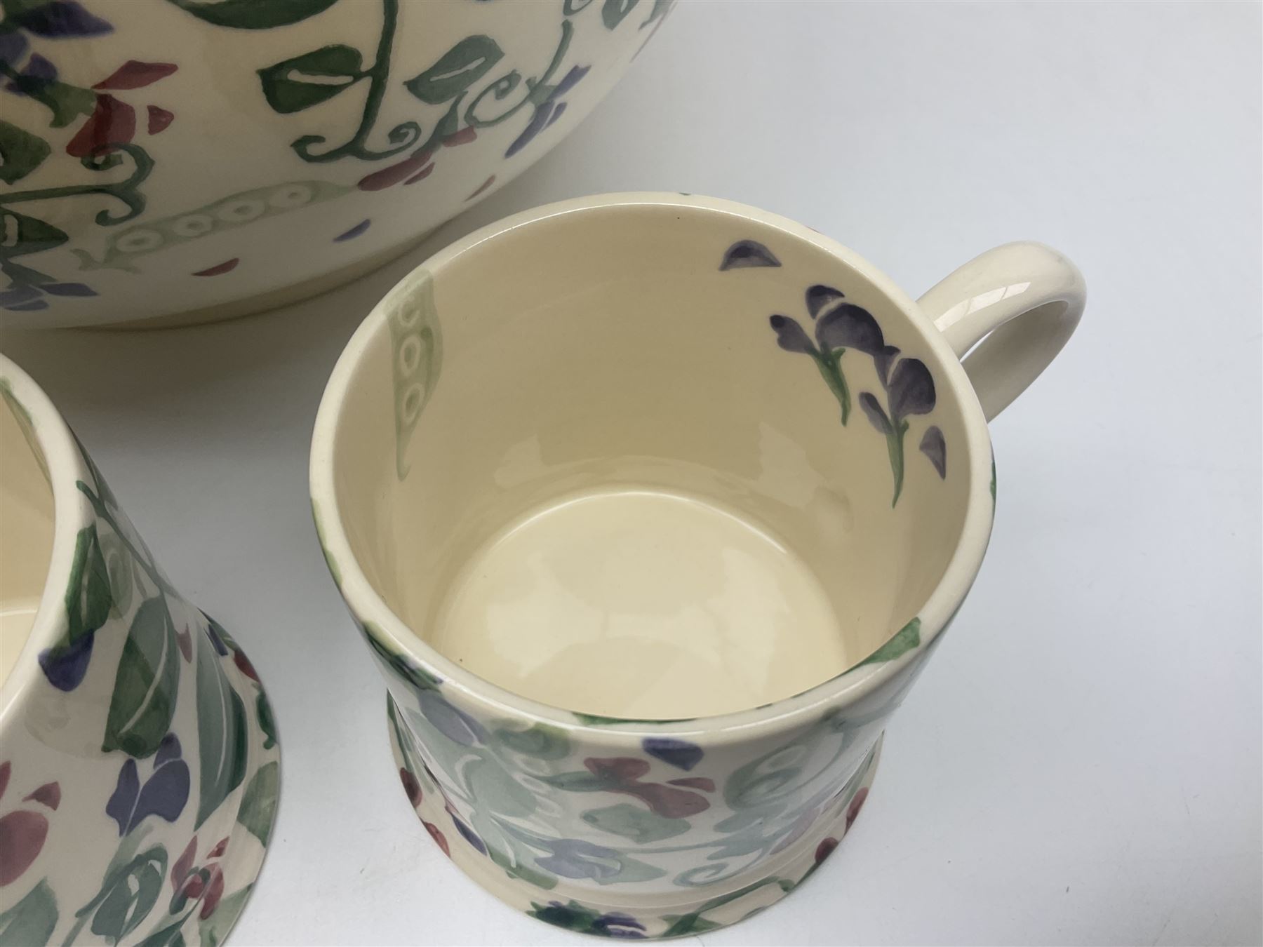 Emma Bridgewater ceramics in Sweet Pea pattern, comprising three cups and a large bowl,  bowl D31cm