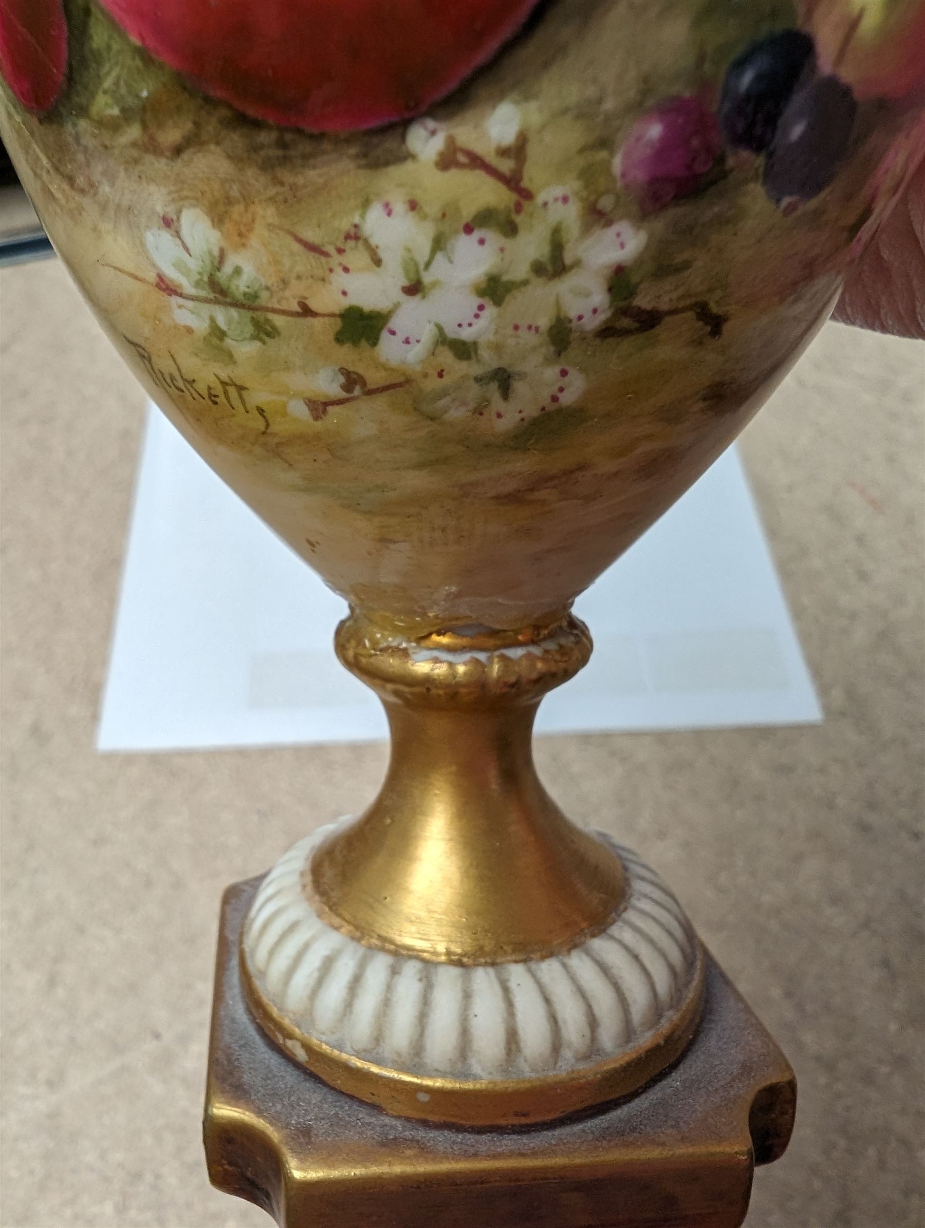 Royal Worcester vase, decorated with fruits among blossom with gilt detailing, H17cm