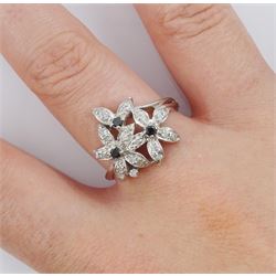9ct white gold black and white diamond flower ring, hallmarked