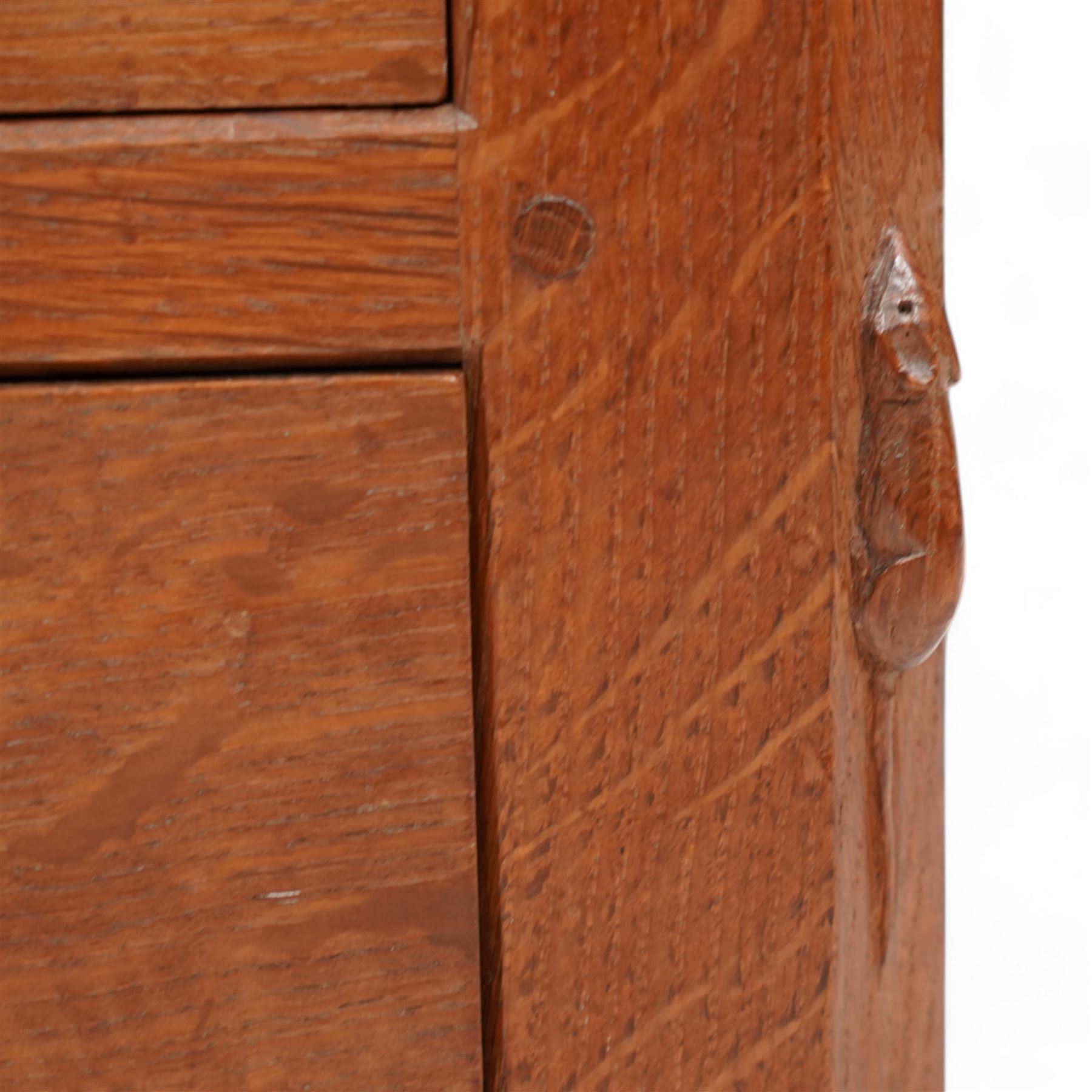 Mouseman - adzed oak pedestal chest, fitted with six drawers each with turned handle, panelled sides, on octagonal feet, by the workshop of Robert Thompson, Kilburn

Provenance - this lot comes to us for sale from direct descent of Robert Thompson. Thompson is the great grandfather of the vendor.