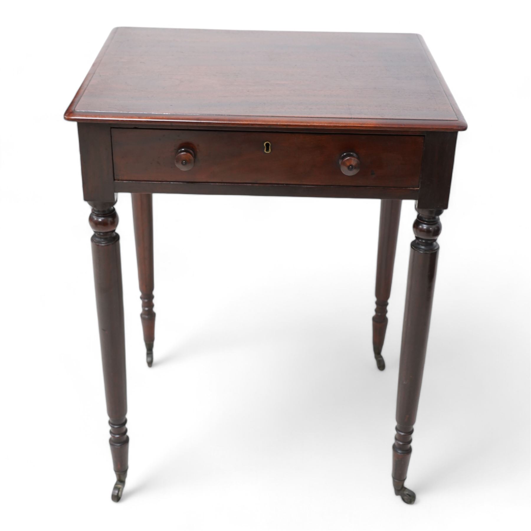 Small 19th century mahogany side table, rectangular top fitted with single drawer, raised on turned supports terminating to castors