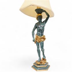 Pair of Italian figural carved table lamps, each modelled as a semi-nude male figure holding a basket above their heads, with green patinated and gilt decoration, on hexagonal bases, H68cm excluding fitting