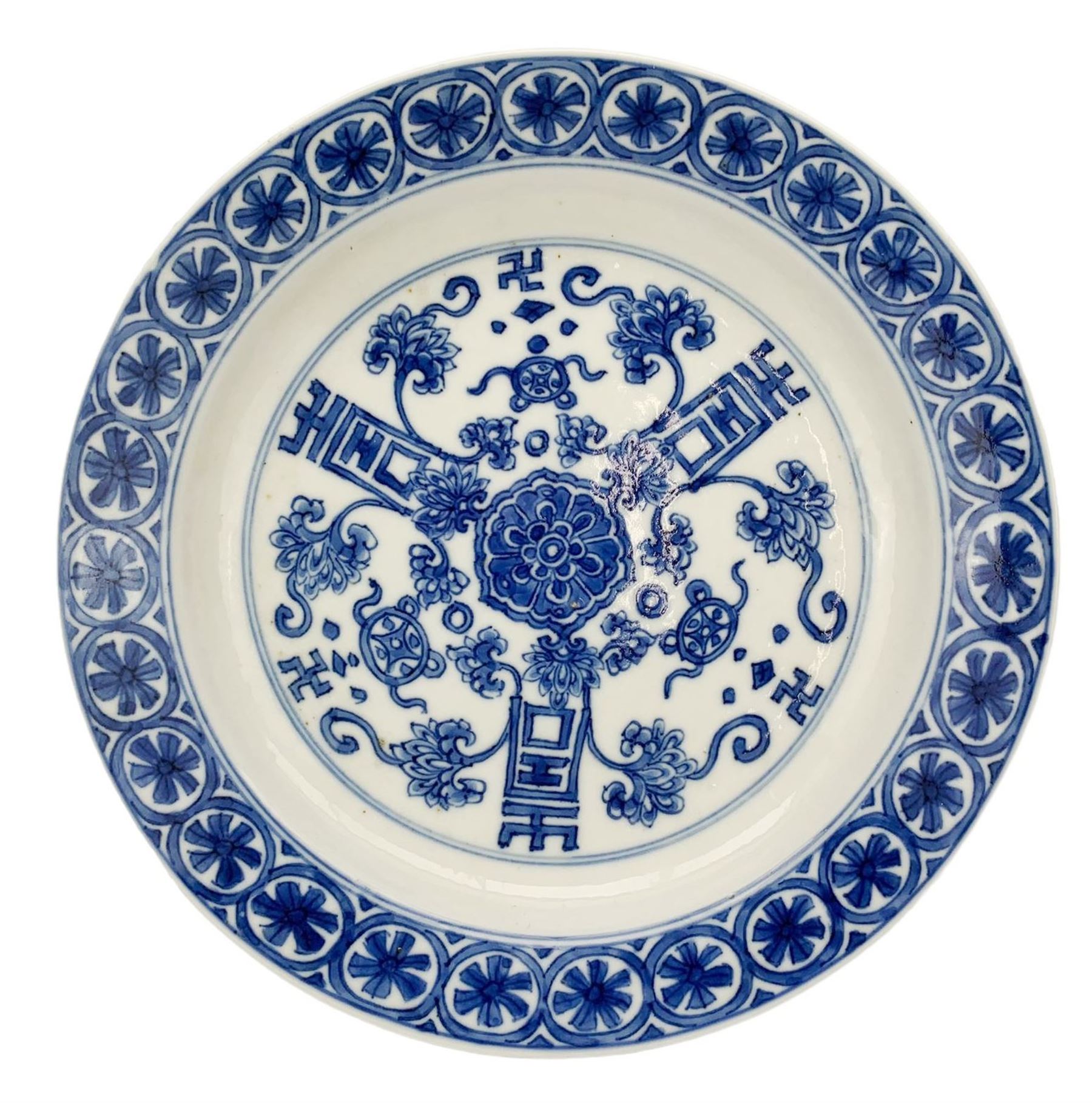 Chinese porcelain dish, Kangxi period, decorated with three shou characters divided by flowers, ribbon tied cash and swastikas, the border with flowerheads in roudels, six character Chenghua mark beneath, D16.5cm 