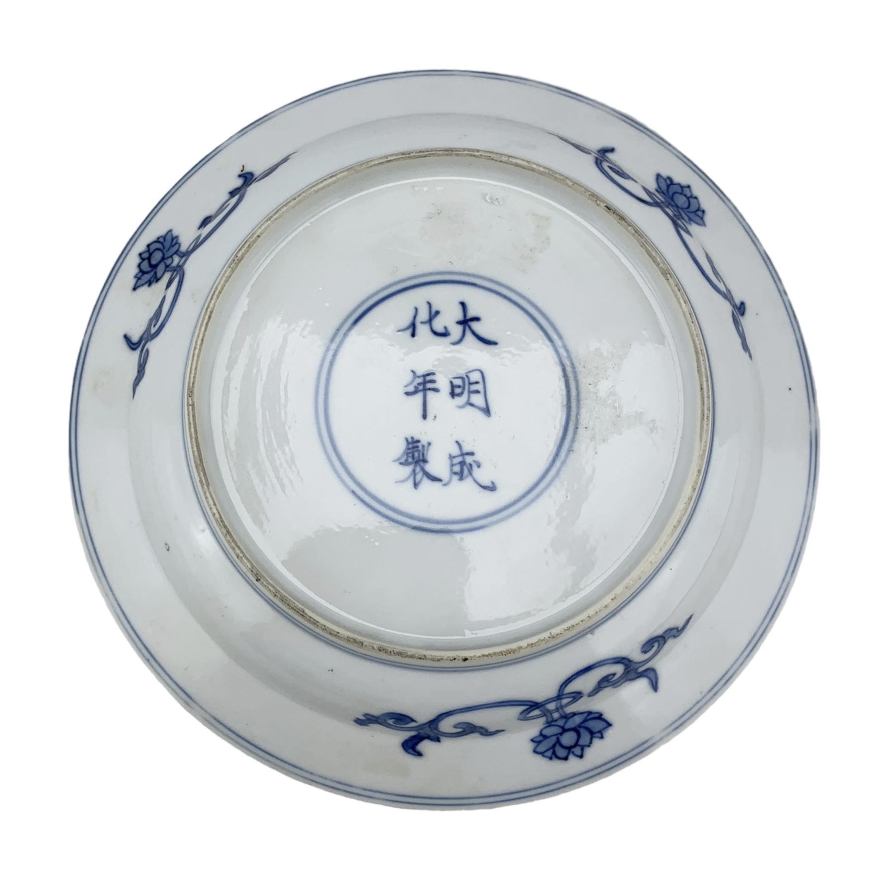 Chinese porcelain dish, Kangxi period, decorated with three shou characters divided by flowers, ribbon tied cash and swastikas, the border with flowerheads in roudels, six character Chenghua mark beneath, D16.5cm 