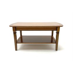 Rectangular walnut coffee table, cross banded top, square tapering supports joined by under tier   