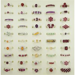 Fifty silver stone set rings including garnet, pearl, serenite and white zircon