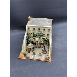 Mixed medium sculpture of house and garden, with makers mark beneath, H15cm