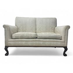 Early 20th century mahogany framed two-seat sofa, upholstered in pale fabric decorated wit...