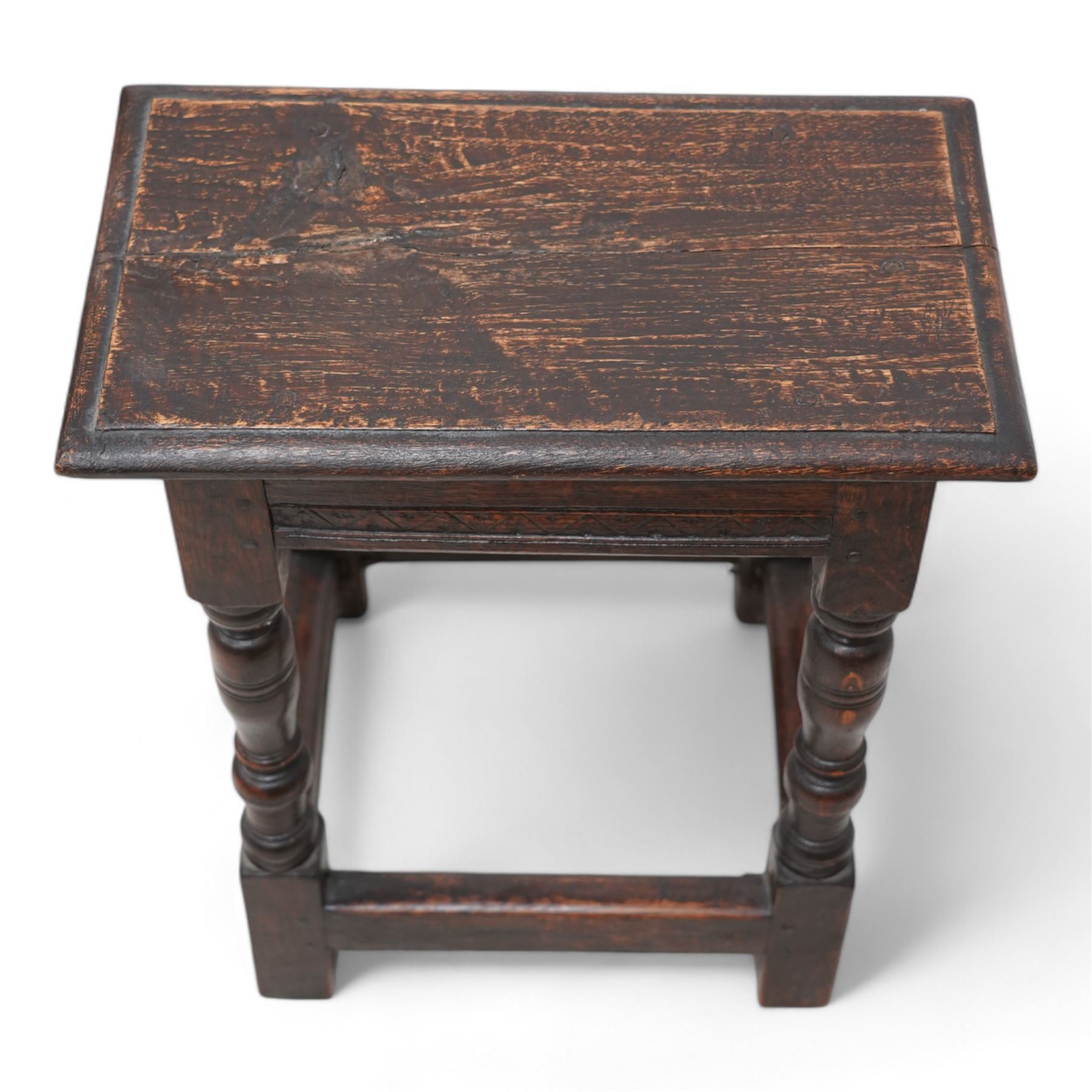 18th century oak joint stool, moulded rectangular top over geometric carved and moulded frieze rails, on turned supports united by plain stretchers 