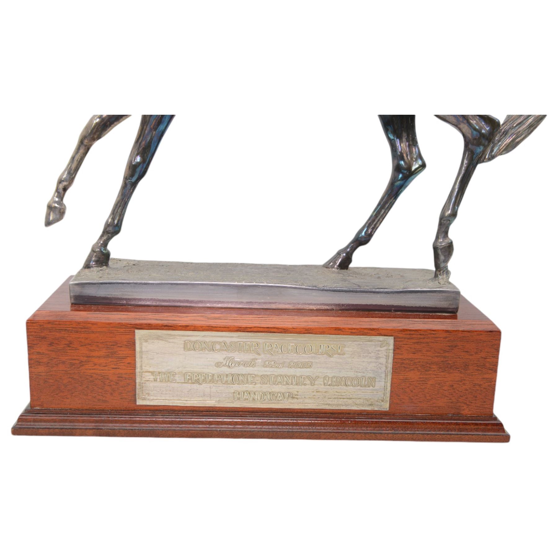 'The Freestone Stanley Lincoln Handicap Trophy, Doncaster Racecourse March 22nd 2003' - Silver filled model of a racehorse H32cm x W42cm on a mahogany plinth with silver plaque Sheffield 2003 Maker Laurence R Watson & Co.