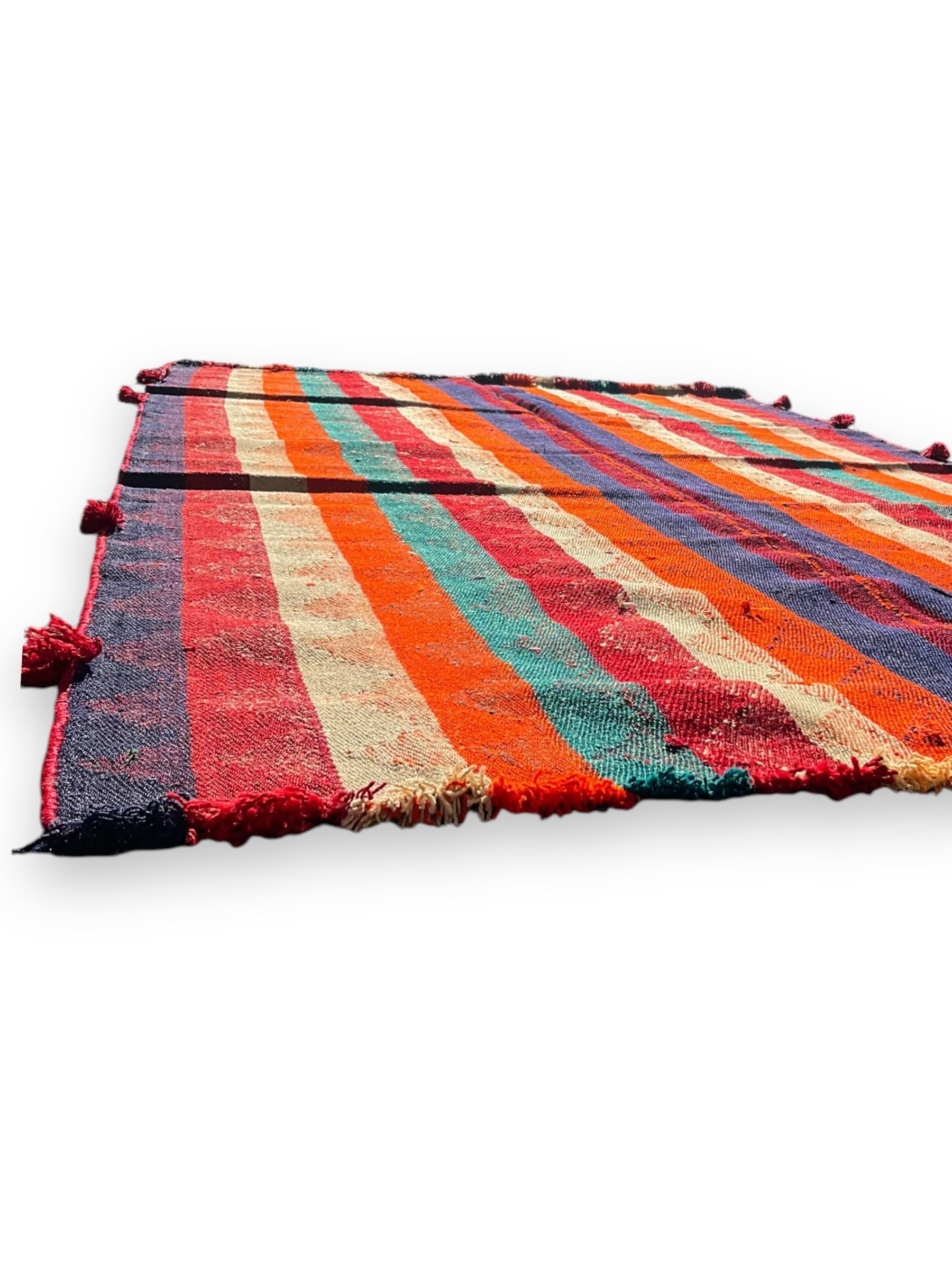 South West Persian Jajim Kilim ground rug, the field with alternating vertical stripes with lightly woven diamond-shaped motifs running through the pattern, the edges with small decorative tufts