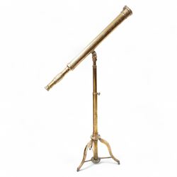 19th century lacquered brass telescope, the barrel on telescopic stem and tripod stand 